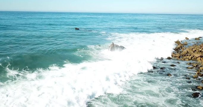 Aerial Waves Crashing on Rocks Malibu CA