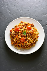 Spaghetti with minced meat and cherry tomatoes