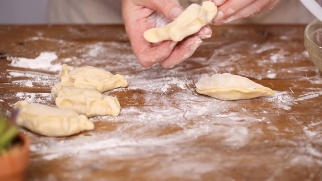 Step by step. Making home made empanadas with red apples fillings