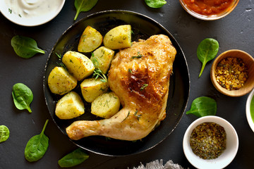 Baked chicken leg with potato