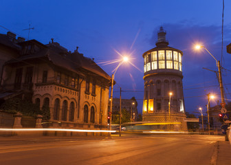 Fototapeta na wymiar old watch tower in Bucharest city, night view