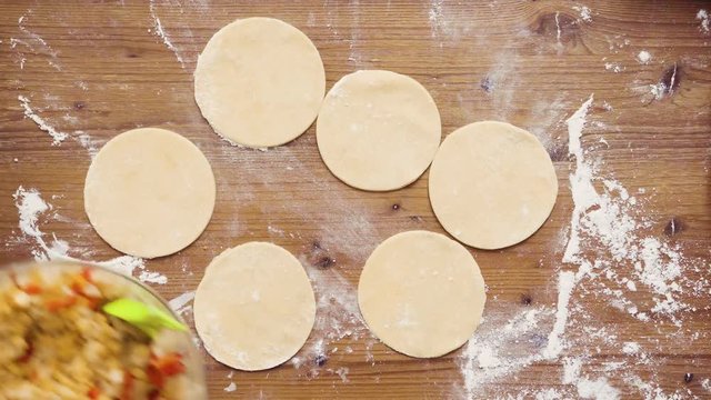 Flat lay. Step by step. Rolling dough for home made empanadas