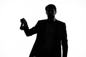 silhouette of a man with a weapon