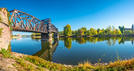 Old Town Railway Bridge in Magdeburg, Elbe river and downtown at Autumn