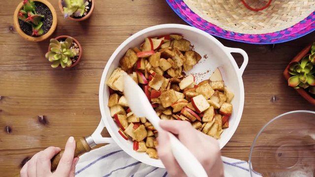Time lapse. Flat lay. Step by step. Frying red apples with brown sugar for filling to make empanadas
