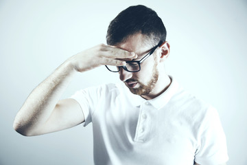 sad man hand in face