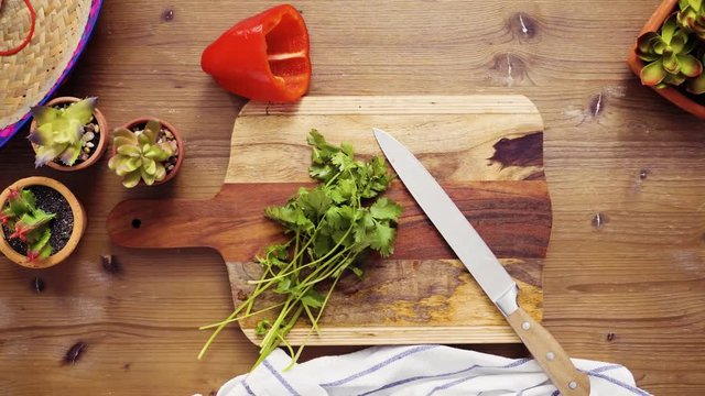 Time lapse. Flat lay. Step by step. Slicing vegetables for filling to make empanadas.