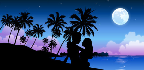 Silhouette of a couple embracing on the beach