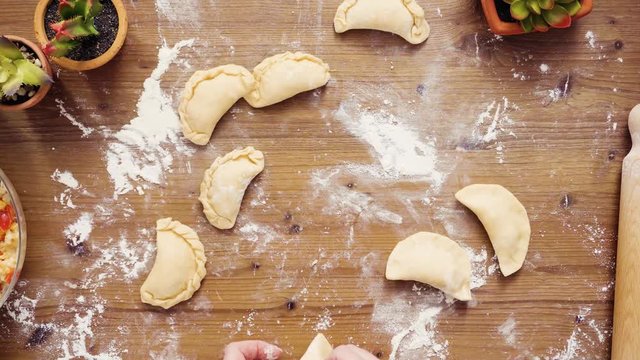 Flat lay. Step by step. Making home made vegetarian empanadas with corn