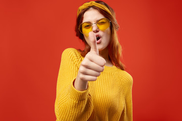 woman showing thumbs up ok signs