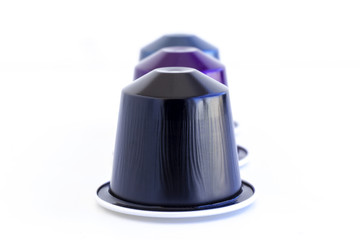Fototapeta premium Italian coffee espresso capsules or coffee pods on isolated white background. Can be used as an element for your design