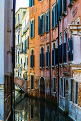 Fototapeta na wymiar Elements of architecture of houses on the streets of the canals of the city of Venice in Italy.