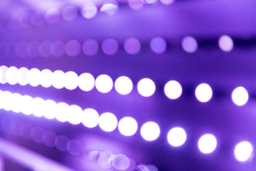 Blurred bokeh background colorful abstract neon lights defocused night life