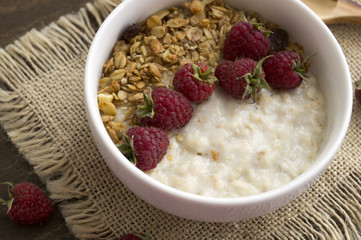 Healthy Breakfast. Oatmeal in a white bowl