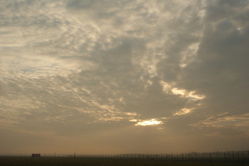 Sunrise in Bremen city in summer on the airport landing road and beautifyl sky clouds