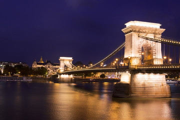 Gorgeously lit chain bridge in Budapest at twilight