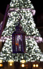 Cristmas tree. Winter holiday background. Decorated Christmas tree with blurred bokeh background.