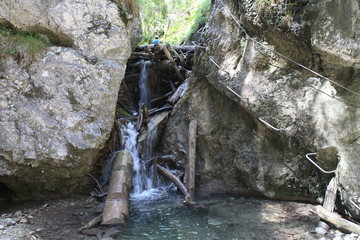 Kaplnkovy vodopad watterfall in Via ferrata in canyon Kyseľ in Slovenský raj (Slovak Paradise...