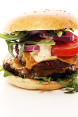 Tasty fresh meat burgers with salad and cheese. Homemade angus burger.