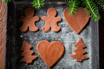 Brown Christmas gingerbread cookies in baking tray