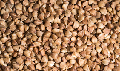 Background, texture, the rump. Buckwheat. Roasted buckwheat. Useful properties of buckwheat. Garnish. Ingredient, product, cook. Brown. Agribusiness, crop, organic farming. Dietary product.