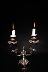 candlestick, vintage silver candlestick with burning candle