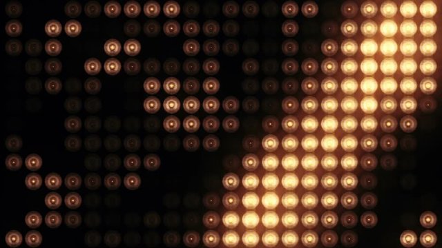 Animation of flashing light bulbs on led wall or projectors for stage lights. Animation of seamless loop.