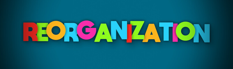 Reorganization - overlapping multicolor letters written on blue background