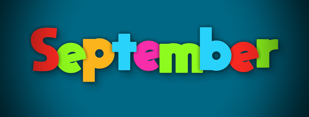 September - overlapping multicolor letters written on blue background