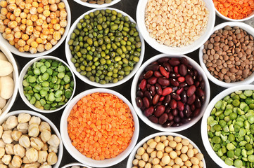 Mix of dry legume varieties: pinto and mung beans, assorted lentils, soyabean, yellow and green peas, chickpea; vegan high protein food for healthy diet