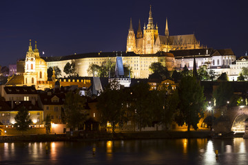 Fototapeta na wymiar Prague gothic Castle with the Lesser Town above River Vltava in the Night, Czech Republic
