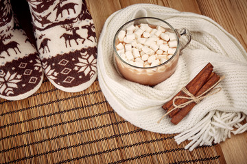 Warm slippers and cocoa with marshmallow.