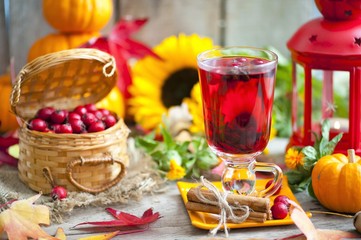 hot winter or autumn drink with spices and wild rose berries, mulled wine, hot wine