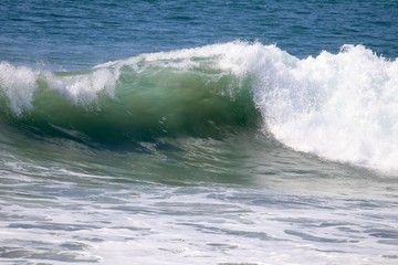 Large empty wave crashing in the ocean 