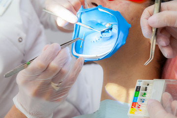 Dental treatment in the dental clinic. Treatment of endodontic canals