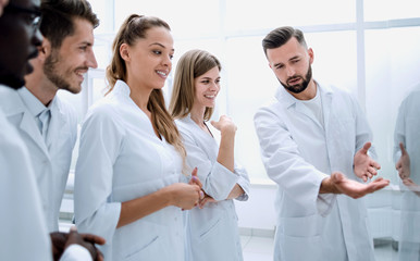 Group of young clinicians experimentation in research laboratory