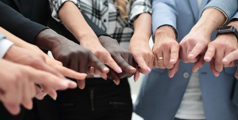 close-up of multi-racial hands