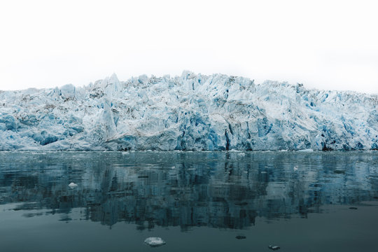 Iceberg reflecting in bay