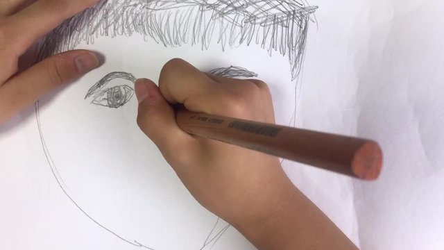 Child draws a picture