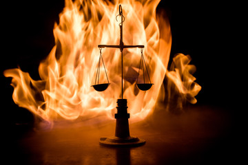 Justice scale with dark toned foggy background. Justice concept. Scale is symbol of justice