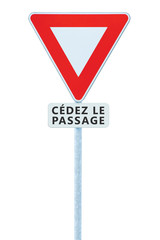 Give way yield french c&eacute;dez le passage road sign France isolated vertical macro closeup signage triangle red frame regulatory warning pole post panneau signalisation traffic priority roadsign signpost
