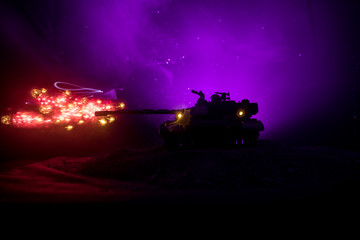 War Concept. Military silhouettes fighting scene on war fog sky background, World War German Tanks Silhouettes Below Cloudy Skyline At night. Attack scene. Armored vehicles. Tanks battle