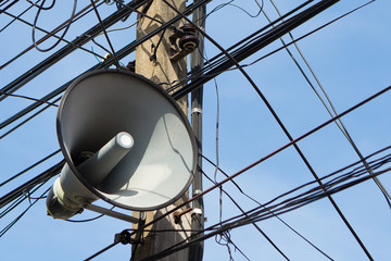 Speakers on the power poles