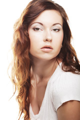 Face of a sexy beautiful young woman with clean skin on a white 