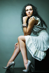 Fototapeta premium woman in elegant dress, studio shot