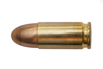isolated 9mm bullet on white background