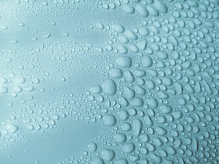 Set of condensation droplet on a light blue color background. abstract background