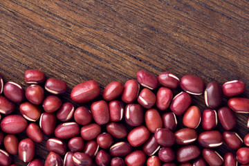 red bean on wooden table.top view