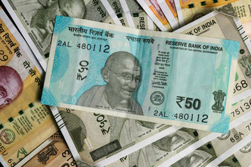 new indian currency,50, 200 and 500 rupees note as background