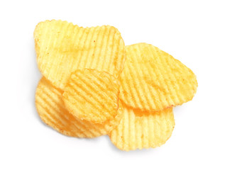Tasty ridged potato chips on white background